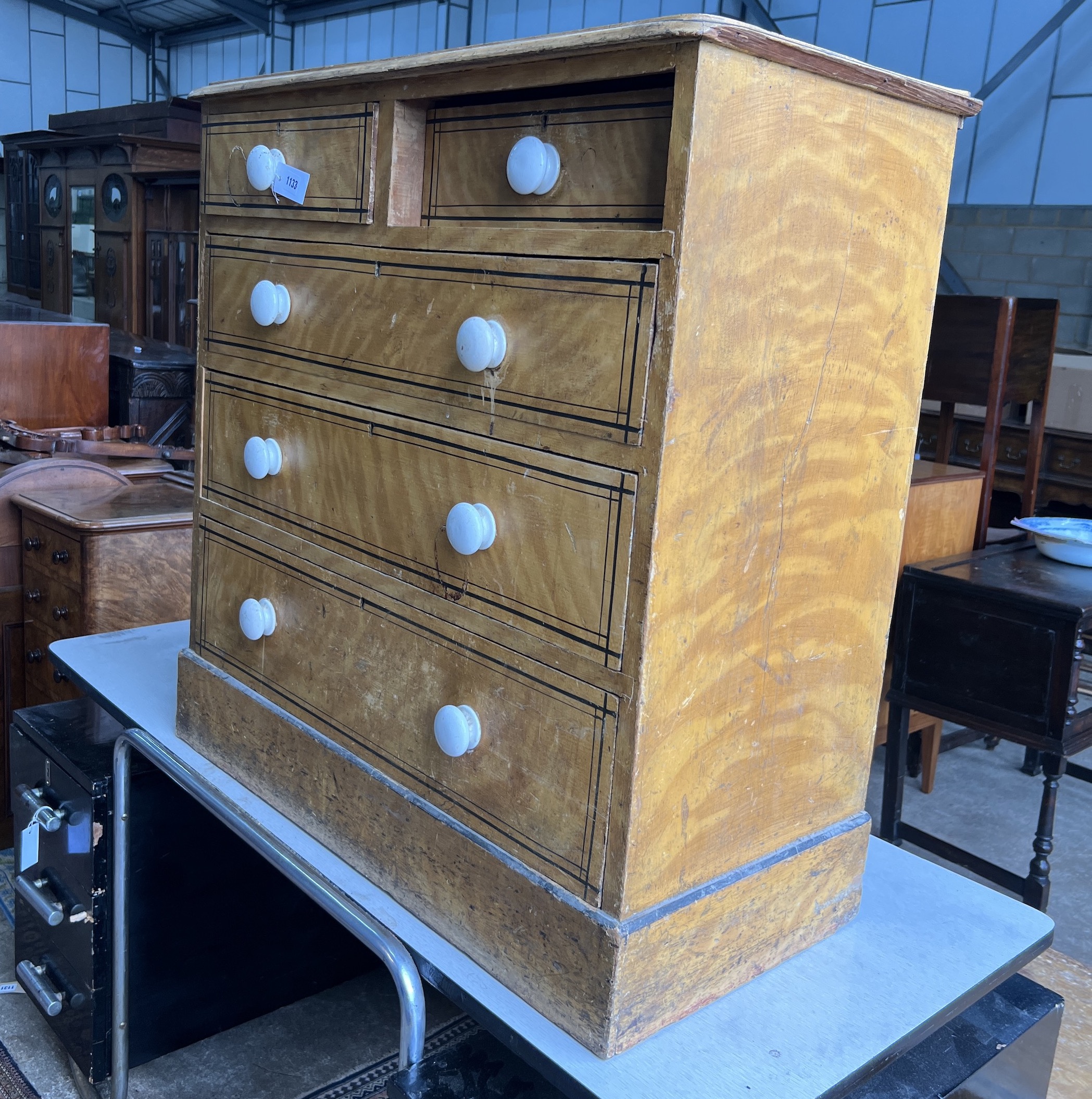 A Victorian pine chest with painted simulated grain, width 90cm, depth 44cm, height 93cm